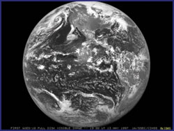 Photo showing GOES-10 first full disk image taken on May 13, 1997 orbiting the Earth.