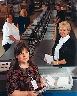 Photo showing Census Bureau employees managing, operating, and supporting a variety of data collection, data capture, and data processing operations.