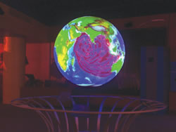 Photo showing a simulation of the Indian Ocean tsunami of December 2004 as projected on the NOAA Science on a Sphere exhibit at Nauticus, the National Maritime Center in Norfolk, VA.