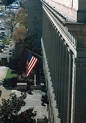 Photo showing the front of the Department of Commerce building from above and to the right.